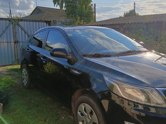 2013 Kia Rio 5-speed III, чёрный, 800000 рублей - вид 11