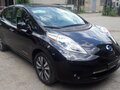 2014 Nissan Leaf (EM57) I (ZE0/AZE0), чёрный, 1490000 рублей - вид 4