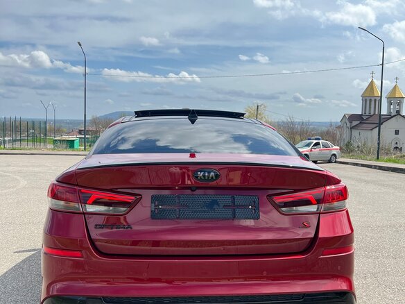 2019 Kia Optima IV Рестайлинг, красный, 2200000 рублей - вид 5