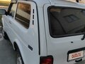 2014 Lada (ВАЗ) 2121 (4x4) I Рестайлинг, белый, 440000 рублей - вид 4