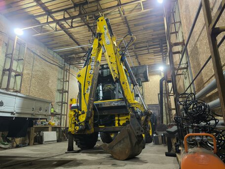 2005 New Holland LB115, золотистый, 5150000 рублей, вид 4