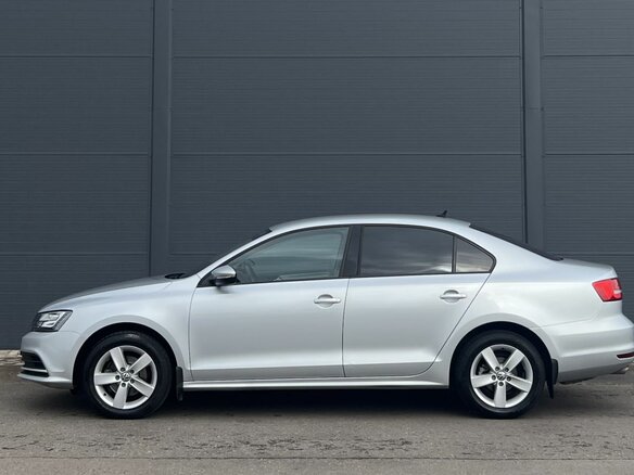2015 Volkswagen Jetta VI Рестайлинг, серебристый, 1080000 рублей - вид 7