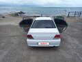 2001 Mitsubishi Lancer Cedia IX, белый, 340000 рублей - вид 2