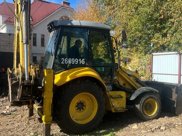 2007 New Holland B110B, жёлтый, 3900000 рублей - вид 1
