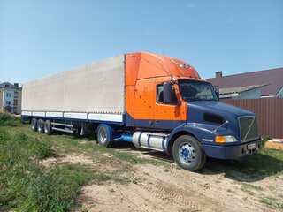2002 Volvo VN, оранжевый, 1700000 рублей, вид 4