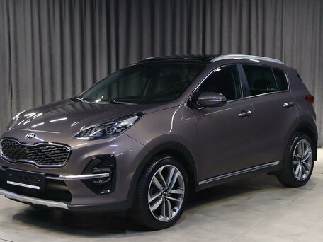 2018 Kia Sportage IV Рестайлинг, коричневый, 1949000 рублей, вид 1