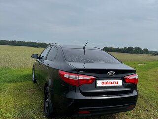 2014 Kia Rio 6-speed III, чёрный, 570000 рублей, вид 5