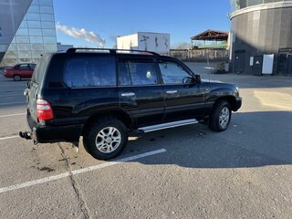 2004 Toyota Land Cruiser 105 100 Series Рестайлинг 1, чёрный, 1600000 рублей, вид 3