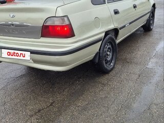 2006 Daewoo Nexia I, жёлтый, 150000 рублей, вид 4