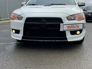 2011 Mitsubishi Lancer X Рестайлинг, белый, 900000 рублей, вид 4