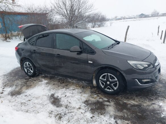 2012 Opel Astra J Рестайлинг, серый, 1350000 рублей - вид 3