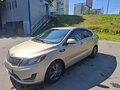 2013 Kia Rio III, бежевый - вид 1