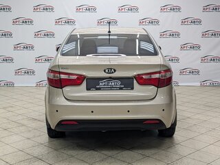 2013 Kia Rio 4-speed III, бежевый, 549000 рублей, вид 5