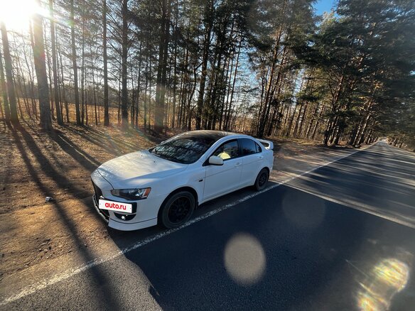2010 Mitsubishi Lancer X, белый, 700000 рублей - вид 1