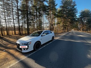 2010 Mitsubishi Lancer X, белый, 700000 рублей, вид 1