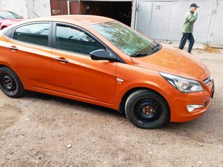 2015 Hyundai Solaris I Рестайлинг, оранжевый, 880000 рублей, вид 5