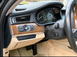 2009 BMW 7 серии 750i V (F01/F02/F04), чёрный, 1100000 рублей, вид 3