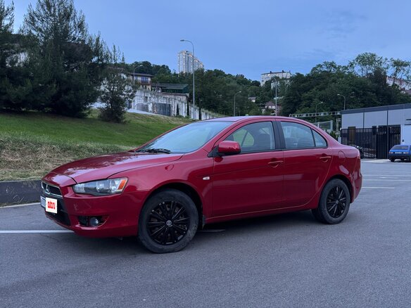 2007 Mitsubishi Lancer X, красный, 635000 рублей - вид 9