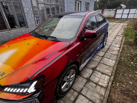 2008 Mitsubishi Lancer X, чёрный, 700000 рублей