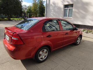 2010 Chevrolet Aveo I Рестайлинг, красный, 340000 рублей, вид 5