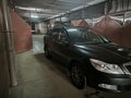 2012 Skoda Octavia II (A5) Рестайлинг, чёрный, 710000 рублей