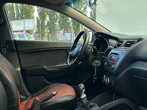 2012 Kia Rio III, серебристый - вид 10