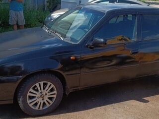 2011 Daewoo Nexia I Рестайлинг, чёрный, 110000 рублей, вид 3