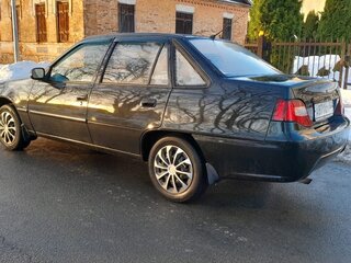2015 Daewoo Nexia I Рестайлинг, чёрный, 299000 рублей, вид 5