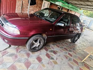2007 Daewoo Nexia I, пурпурный, 360000 рублей, вид 1