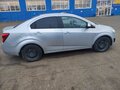 2014 Chevrolet Aveo II, серебристый, 820000 рублей - вид 4