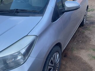 2011 Toyota Vitz III (XP130), серый, 815000 рублей, вид 4
