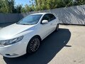 2012 Kia Cerato 6-speed II, белый, 950000 рублей