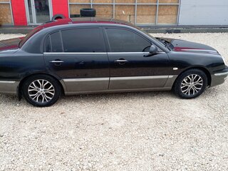 2006 Kia Opirus I, чёрный, 600000 рублей, вид 4