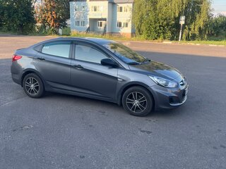 2012 Hyundai Solaris I, чёрный, 850000 рублей, вид 5