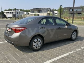2018 Toyota Corolla XI (E160, E170, E180) Рестайлинг 1, коричневый, 1230000 рублей, вид 3