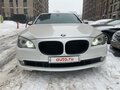2009 BMW 7 серии 740i V (F01/F02/F04), белый, 1850000 рублей - вид 1