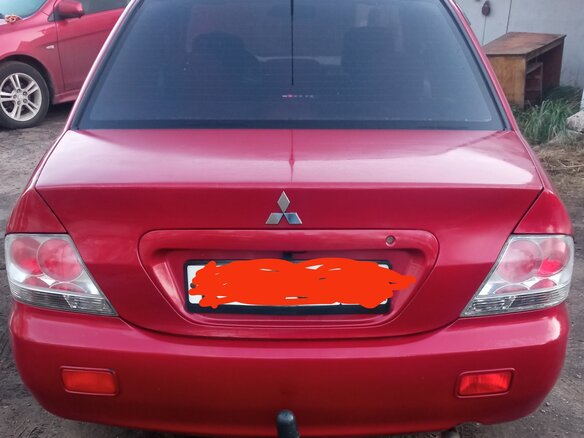 2004 Mitsubishi Lancer IX, красный - вид 2