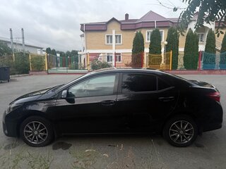 2014 Toyota Corolla XI (E160, E170, E180), чёрный, 1250000 рублей, вид 4