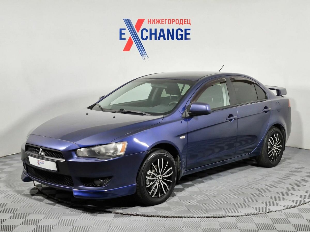Открыть фотографии: Mitsubishi Lancer X