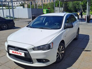 2011 Mitsubishi Lancer X Рестайлинг, белый, 850000 рублей, вид 1