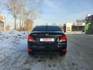 2013 Hyundai Solaris I, чёрный, 850000 рублей, вид 3