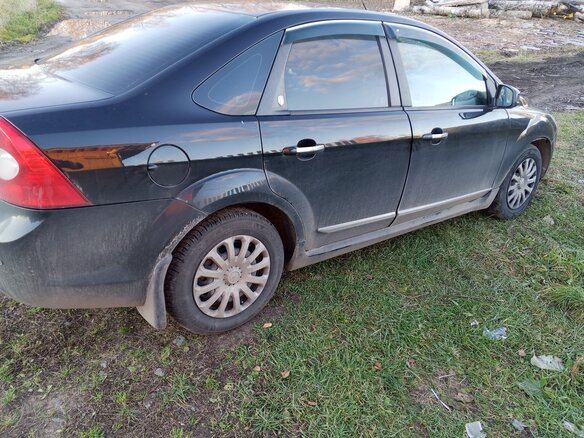 2009 Ford Focus II Рестайлинг, чёрный, 500000 рублей - вид 1