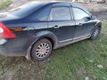 2009 Ford Focus II Рестайлинг, чёрный, 500000 рублей - вид 1