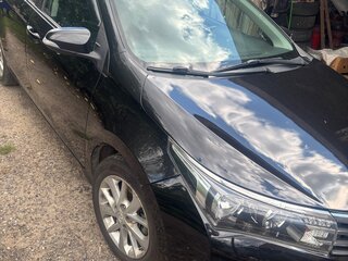 2013 Toyota Corolla XI (E160, E170, E180), чёрный, 1100000 рублей, вид 1