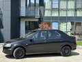 2010 Renault Logan I Рестайлинг, чёрный, 299999 рублей - вид 3
