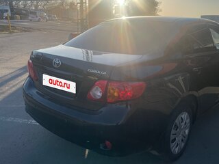 2008 Toyota Corolla X (E140, E150), чёрный, 650000 рублей, вид 3
