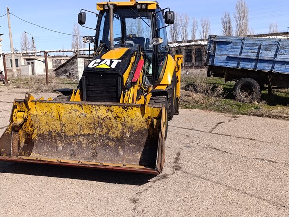 2008 Caterpillar 428, жёлтый, 5500000 рублей - вид 5