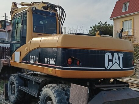 2006 Caterpillar M316, жёлтый, 6700000 рублей, вид 3