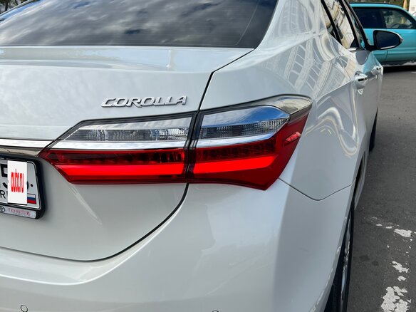2018 Toyota Corolla XI (E160, E170, E180) Рестайлинг 1, белый - вид 14