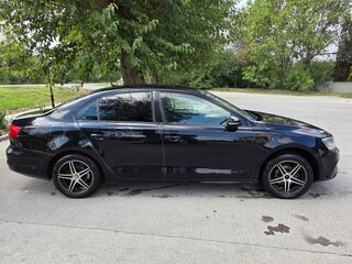 2015 Volkswagen Jetta VI Рестайлинг, чёрный, 700000 рублей, вид 4